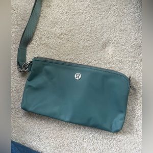 Lululemon Curved Wristlet/Clutch in seafoam green (8.5" x 1.2" x 4.5")